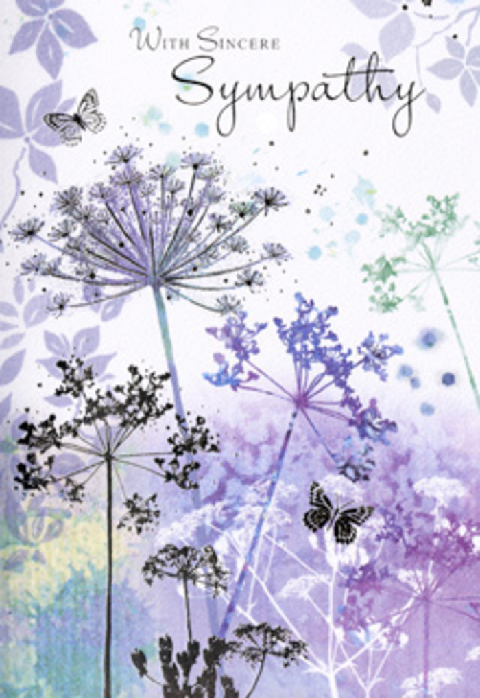 This sympathy card presents a tranquil, nature-inspired tableau that feels as if it could have been sketched after a peaceful walk around the green spaces of Hook. Taller-than-life, slender wildflower stems rise in graceful arcs from the lower edge of the card, each one topped with a filigree cluster of tiny blossoms. These umbelliferous blooms are rendered in soft shades of violet, heather, and powdery blue, their outlines so delicate they seem to shimmer against the softly blurred background. Behind them, hazy washes of muted purple, silvery green, and gentle blue flow together in a watercolour mist, creating the impression of distant meadows dissolving into light. There is no sharp horizon, only a gradual fading that invites contemplation, like watching morning fog lift slowly over Hook's quiet streets. Two butterflies hover among the stems, their wings translucent and lightly tinted, capturing the suggestion of movement without disturbing the card's serenity. They speak of transformation and ongoing presence, subtle symbols of remembrance floating in the calm air. The light within the illustration is diffuse, as though filtered through a thin veil of cloud, softening every line and colour. As someone who arranges sympathy flowers for families across Hook, I recognise that this card is not about grandeur but about gentleness. Its cool, calming palette, refined detail, and generous open space echo the quiet moments shared after a funeral, when stories and memories are exchanged in hushed voices. The design becomes an invitation to pause, breathe, and honour a life with sincerity and grace.